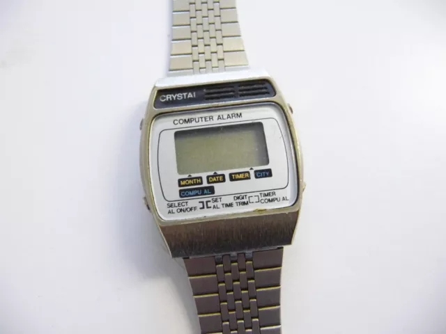 Vintage Crystal Computer Alarm wrist watch; LCD digital display; 1970's era