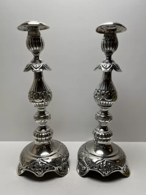 Ornate silver candlesticks marked sterling 84 pair of silver candlesticks