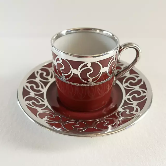 Rosenthal Porzellan Tasse mit Untertasse in Weinrot mit Silber Overlay