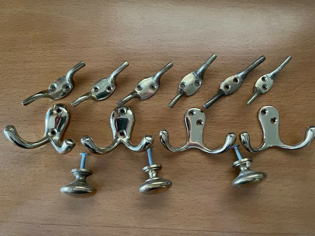 Brass tie downs, coat hooks and drawer knobs