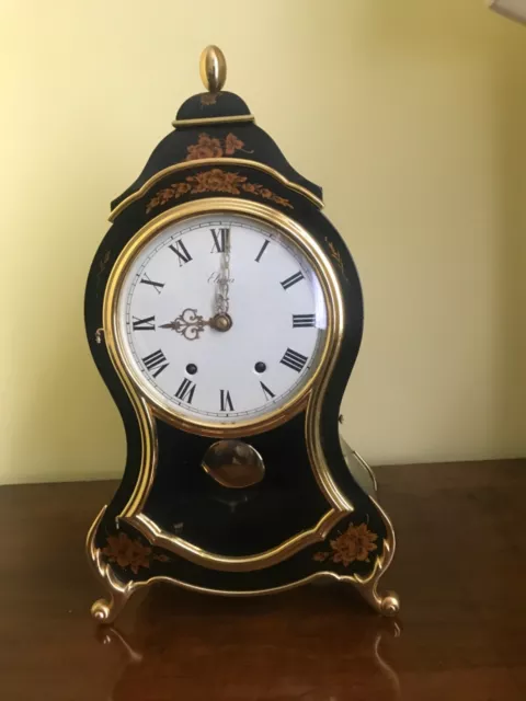 Swiss Bradux Neuchatel clock with wall support working perfectly