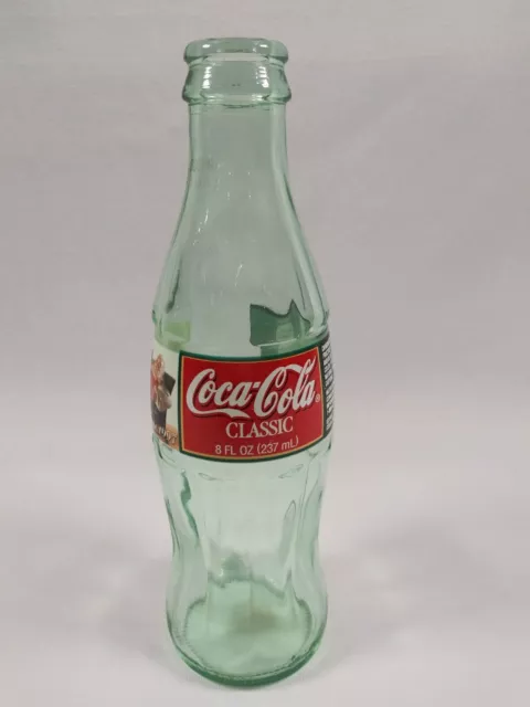 2 Coca-Cola Bottles Christmas 1997 empty 7.5" Tall