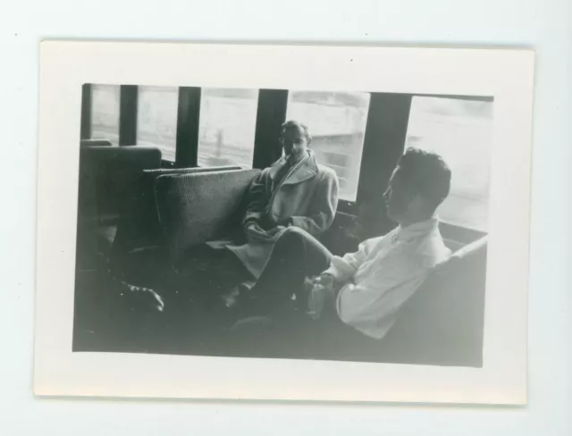 Guys relaxing on train smoking cigarettes  vintage snapshot found Photo
