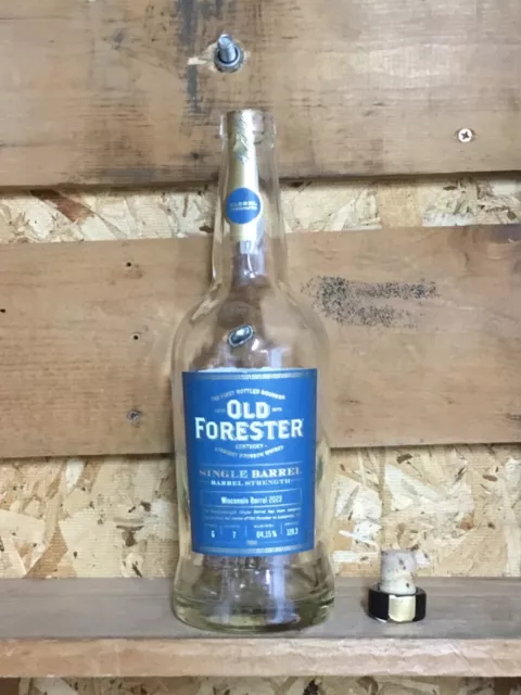 Empty Old Forester single barrel Kentucky bourbon whiskey bottle