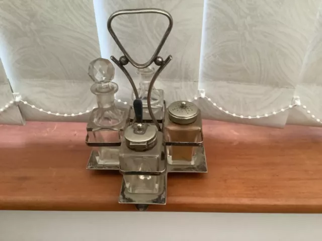 Vintage J S & S  4 piece EPNS & glass cruet set .      (RW)