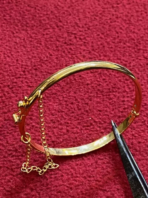 lady woman gold plated bangle bracelet with safety chain