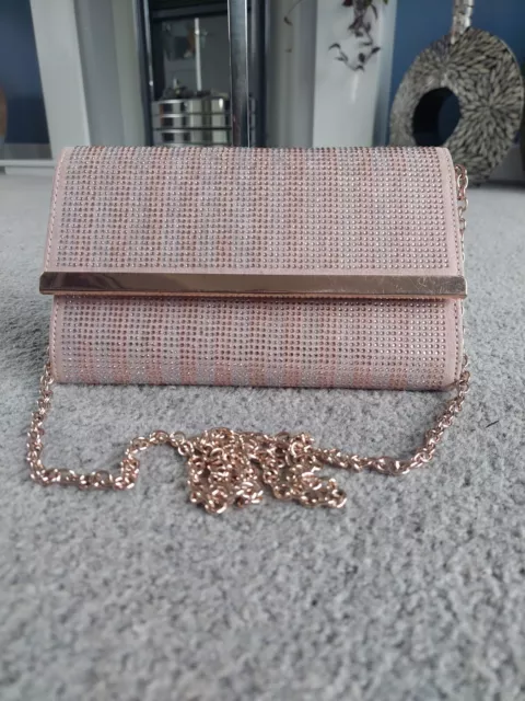 Roland cartier rose top gold bag