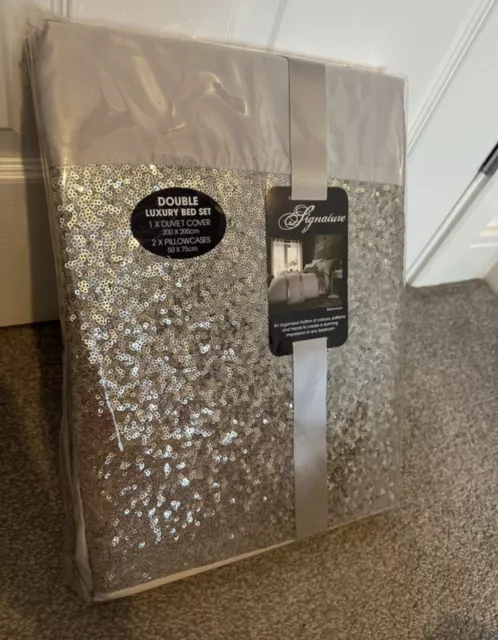 Juego de edredón glamoroso colección firma plata
