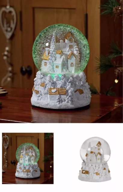 christmas snow globe musical