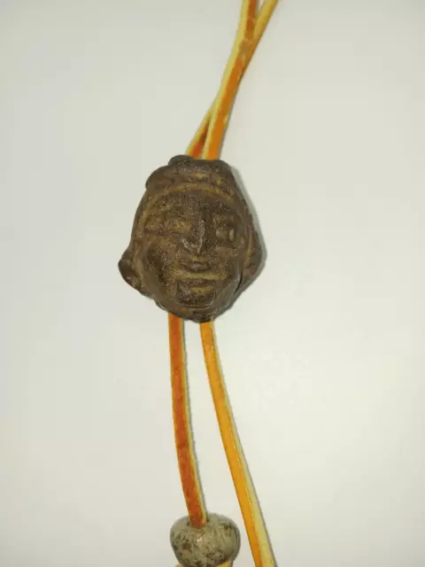 Pre Columbian Face Sculpture Bolo Tie with Stone Bead Tips And Leather Rope