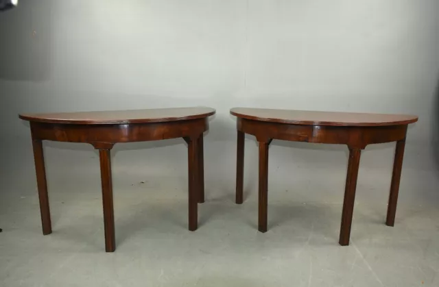 Pair of Georgian mahogany demi lune console tables