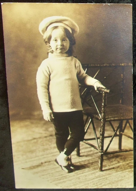 RPPC adorable child beside chair vtg real photo postcard by BJ Phelps/Chicago IL