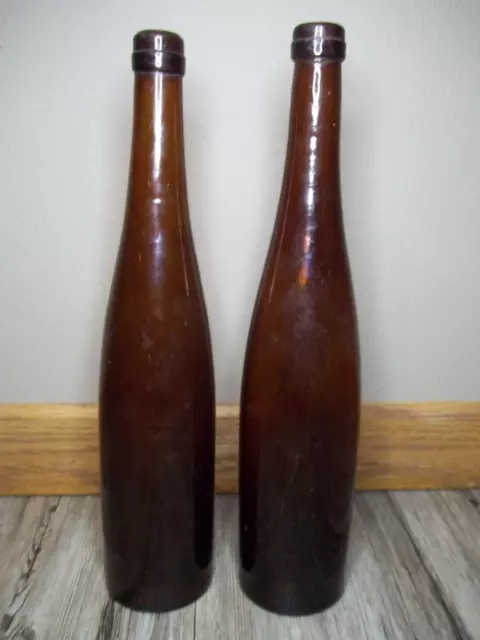 pair late 1800's large amber beer bottles cork top mold blown amber glass    Z48