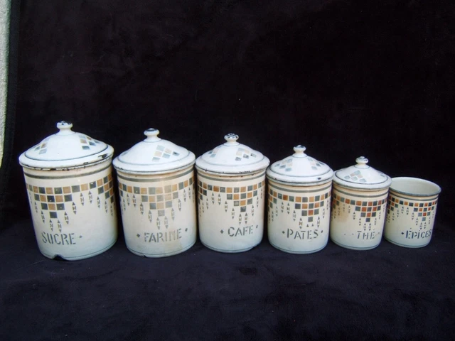 Série de 6 pots à épice en tôle émaillée