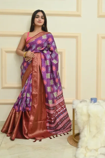 The rich and premium soft silky Banarasi dola saree with all over Batik concept