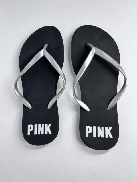 Victoria secret PINK flip flops SIZE large 7/8 black/silver logo