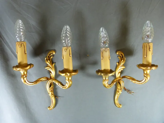 Pair of Rococo style gilt bronze French wall sconces
