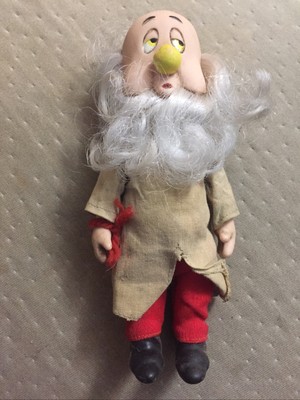 sleepy dwarf figurine