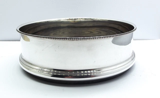 Antique Silver plate wine bottle coaster 19th century.