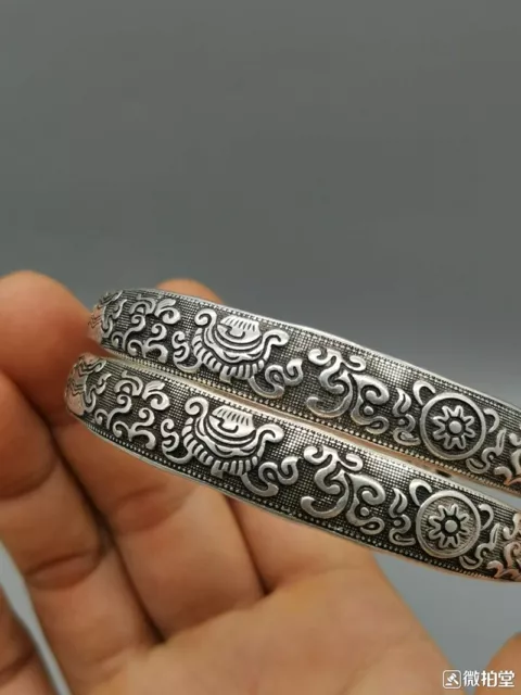 A Pair Old Chinese tibet silver handcarving flowers pattern Bracelet 2