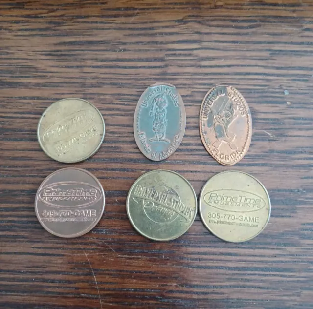 6 Universal  STUDIOS TOKENS , FLAT PENNY TOKENS TOO