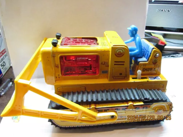 Vintage  Battery Operated Tin toy bulldozer Japan.