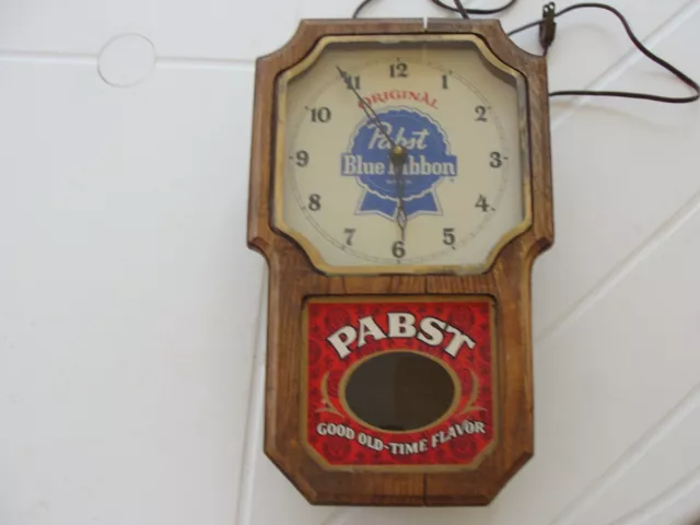 VTG PABST BLUE RIBBON BEER  LIGHTED WALL CLOCK W/ PENDULUM - Has Imperfections.