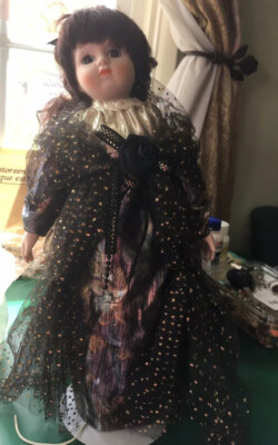 Porcelain Brunette Doll With Black And Gold Lace Dress