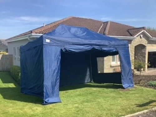 LARGE HEAVY DUTY gazebo. 3m x 4.5m. Four sides, water barrel weights. £