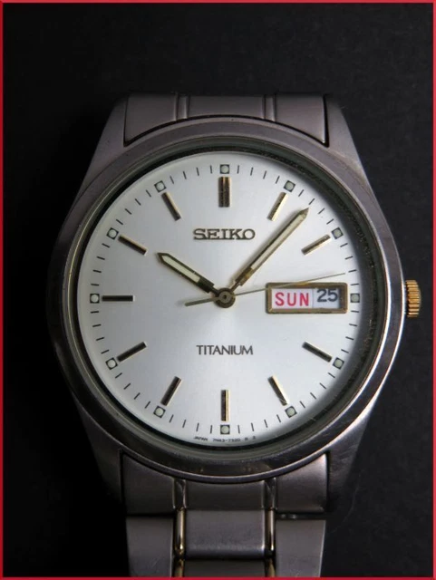 Beauty  SEIKO Quartz 3 Hand Day Date Titanium Genuine Belt TN43 7080 Japan Men