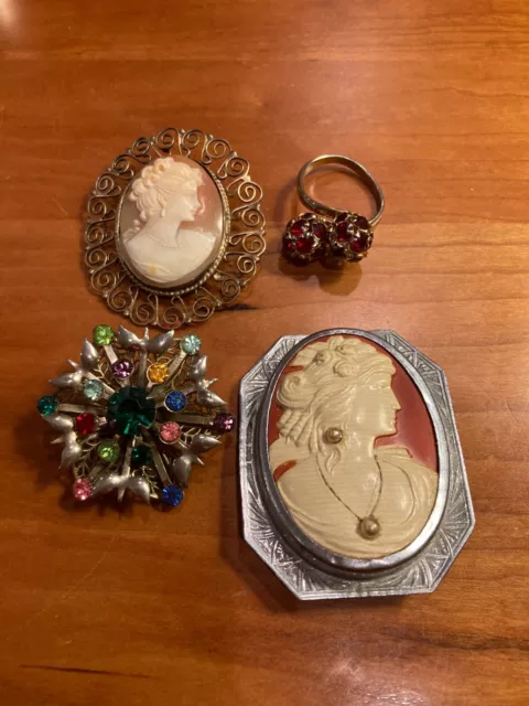 Four old Interesting pieces of jewelry.