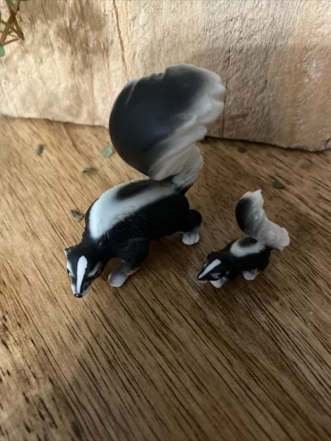 Vintage Miniature Skunk Set Of 2 Figurines Porcelain