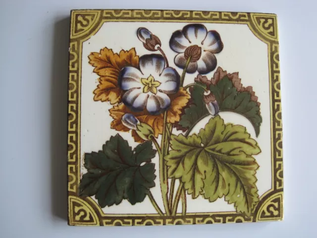 ANTIQUE VICTORIAN H A OLLIVANT? PRINT AND TINT WALL TILE - PURPLE FLOWERS c1895