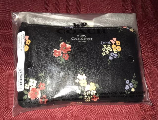 Coach Outlet Corner Zip Wristlet With Graphic Ditsy Floral Print in Pink