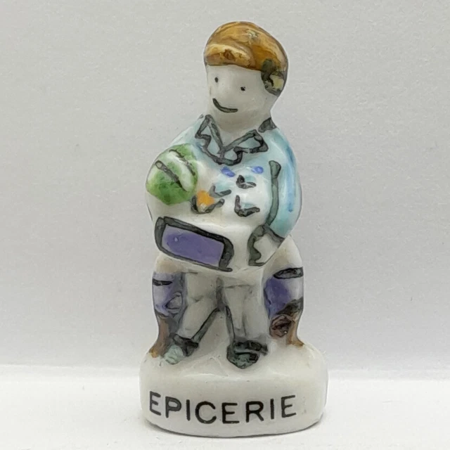 Fève Épicerie en porcelaine Nordia 1994 (B21L)