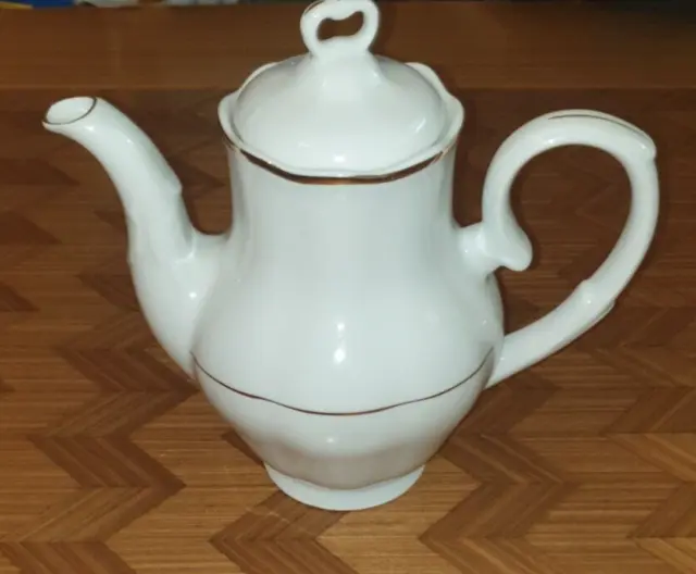 https://www.picclickimg.com/yL4AAOSwjQ1lkPvt/Vintage-Karolina-Tea-Coffee-Pot-Poland-FREE-POSTAGE.webp