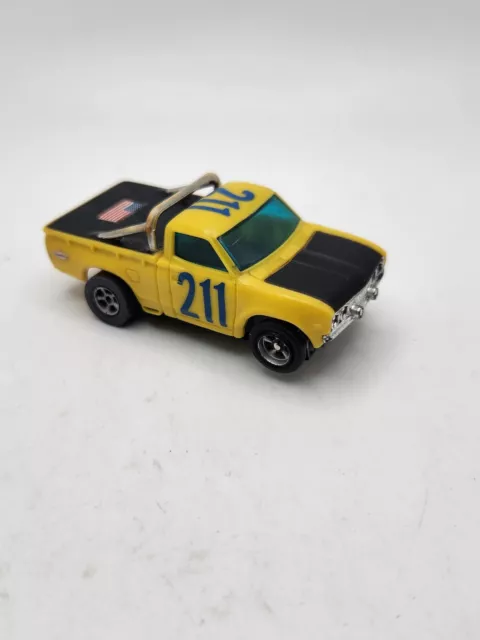 AFX Aurora Datsun Baja Pick Up Truck Yellow and Black #211 Slot Car Runs Nice