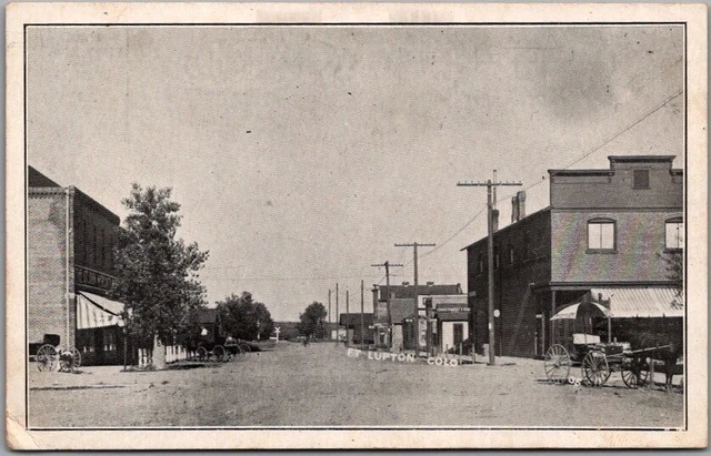 Vintage 1910s FORT LUPTON, Colorado Postcard Main Street / Downtown Scene UNUSED