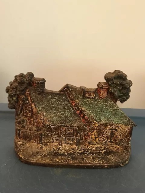 Cast Iron Rustic Cottage Doorstop