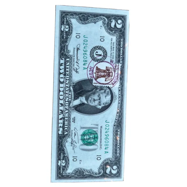 One 1976 series J stamped two dollar bill gem mint