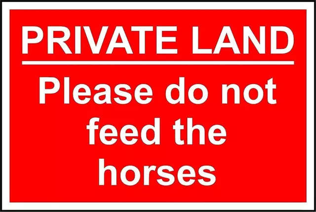 Private land please do not feed the horses safety sign