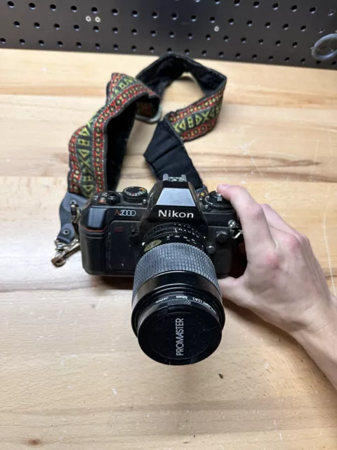 (i) Nikon N2000 35mm SLR Film Camera With 70-210mm Lens