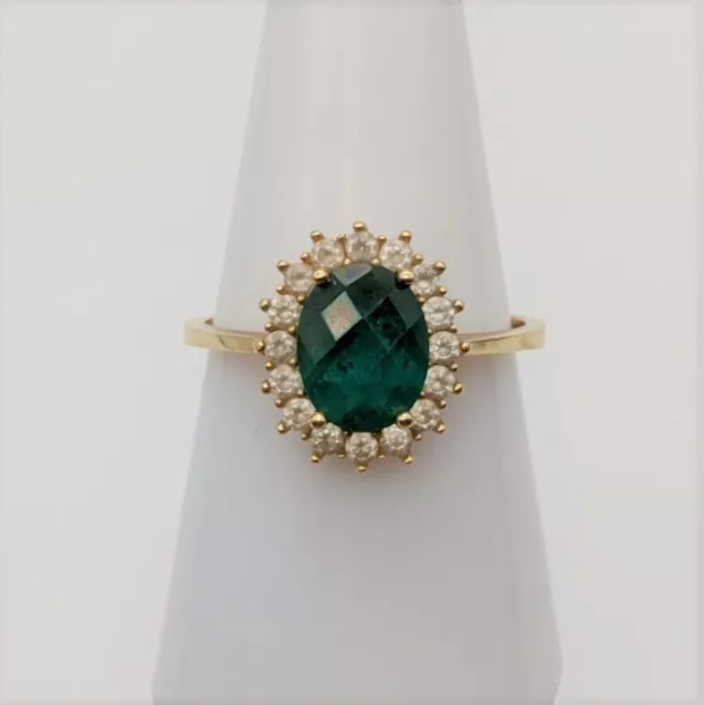 A Stunning 14ct Yellow Gold Ring with Green Topaz and Cubic Zirconia