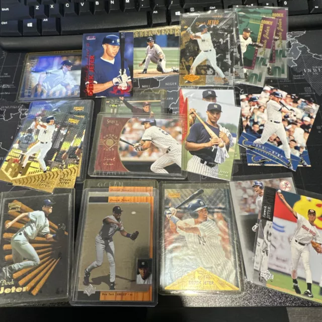 Derek Jeter HOF lot of 15 different baseball cards multiples years.  21 Total