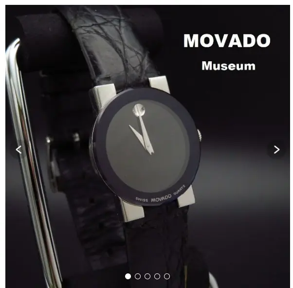 MOVADO Swiss made women ladies Quartz watch running silver black tone