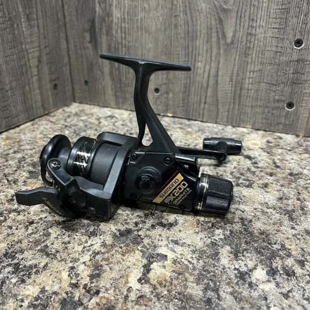 SHIMANO FX200 GRAPHITE Construction Spinning Reel Quick Fire II Fishing reel  $17.99 - PicClick