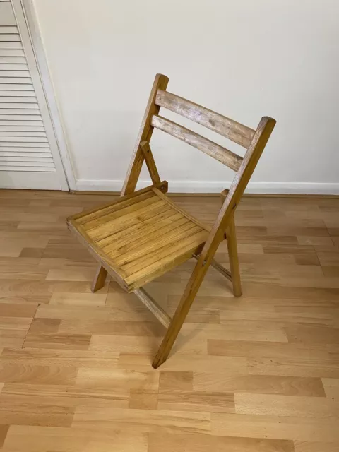 Silla plegable de madera vintage