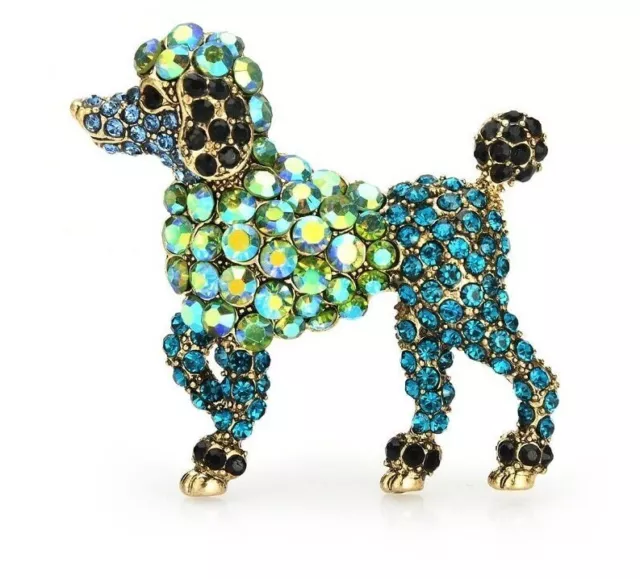 Broche fantaisie en acier doré pierres en cristal   forme chien