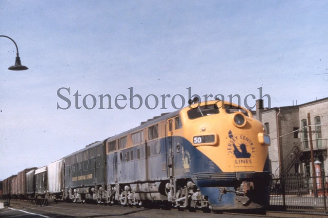 Duplicate railroad slide: CNJ #50 F3 A-B set with freight; 1950's