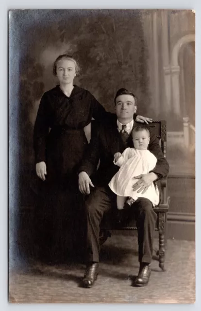 c1910~Family with Baby~Handsome Studio Portrait~Dark~Antique RPPC Postcard